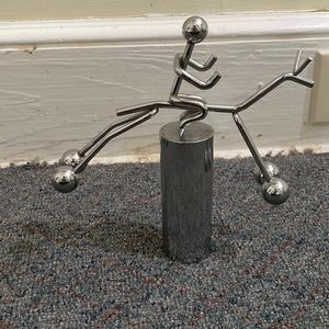Balancing Man on Horse Figurine